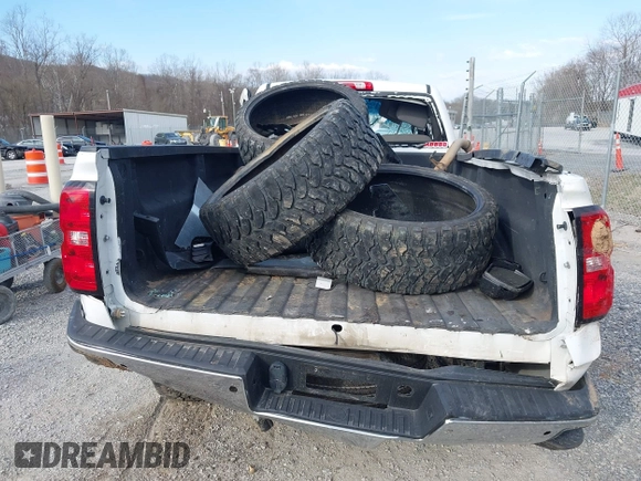 2015 Chevrolet Silverado 1500 Work Truck with VIN 1GCNCPEH6FZ437333, listed as a IAAI auction lot 41866525 with 76,526 mi miles and . Bid and sale history available at DreamBid. Image 17.