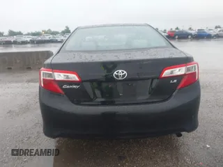 2014 Toyota Camry L with VIN 4T1BF1FK0EU823710, listed as a IAAI auction lot 42153523 with 105,468 mi miles and . Bid and sale history available at DreamBid. Image 16.