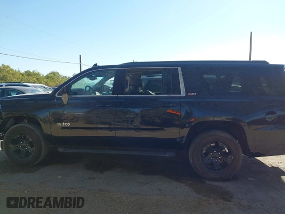 2020 Chevrolet Suburban LT with VIN 1GNSKHKC5LR303081, listed as a IAAI auction lot 41896511 with 60,121 mi miles and . Bid and sale history available at DreamBid. Image 13.