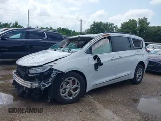 2023 Chrysler Pacifica Limited with VIN 2C4RC1GG4PR619997, listed as a IAAI auction lot 42421682 with 51,520 mi miles and . Bid and sale history available at DreamBid. Image 2.