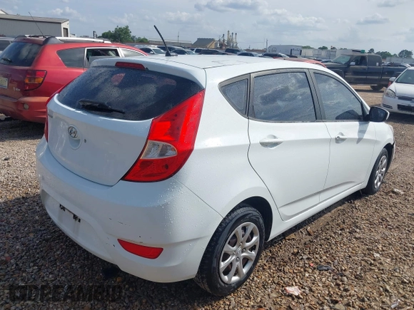 2014 Hyundai Accent GS with VIN KMHCT5AE6EU157751, listed as a IAAI auction lot 42161112 with 145,653 mi miles. Bid and sale history available at carsss.com. Image 4.