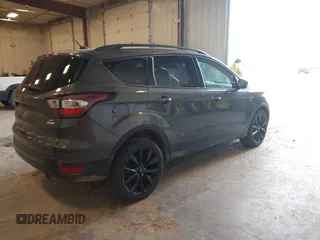 2017 Ford Escape SE with VIN 1FMCU0GD1HUC33119, listed as a IAAI auction lot 41884514 with 99,537 mi miles. Bid and sale history available at carsss.com. Image 4.