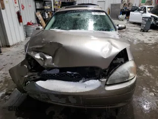 2002 Ford Taurus SES Standard with VIN 1FAFP552X2A245131, listed as a Copart auction lot 51643345 with 84,858 mi miles and Non Repairable. Bid and sale history available at DreamBid. Image 5.