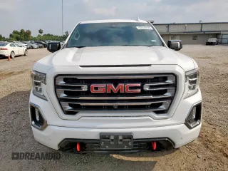 2021 GMC Sierra 1500 AT4 with VIN 3GTP9EEL9MG124953, listed as a Copart auction lot 57510725 with 64,609 mi miles and Salvage title. Bid and sale history available at DreamBid. Image 5.