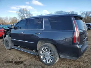 2015 Cadillac Escalade Platinum z VIN 1GYS4PKJ9FR643540, wystawiony jako Copart lot #80931014 z przebiegiem 156 820 mil mil oraz Szkoda całkowita • Salvage title. Historia ofert i sprzedaży dostępna na DreamBid. Obrazek 2.