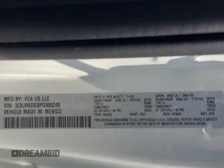 2023 Ram 1500 Tradesman z VIN 3C6JR6DG8PG655248, wystawiony jako IAAI lot #42516552 z przebiegiem 42 464 mil mil oraz . Historia ofert i sprzedaży dostępna na DreamBid. Obrazek 1.