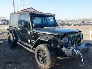 2016 Jeep Wrangler Sport z VIN 1C4AJWAG3GL334497, wystawiony jako IAAI lot #40509311 z przebiegiem 75 217 mil mil oraz . Historia ofert i sprzedaży dostępna na DreamBid. Obrazek 1.