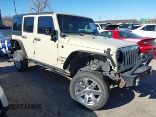 2012 Jeep Wrangler Unlimited Sport z VIN 1C4BJWDG8CL102486, wystawiony jako IAAI lot #41386649 z przebiegiem 156 993 mil mil oraz . Historia ofert i sprzedaży dostępna na DreamBid. Obrazek 1.