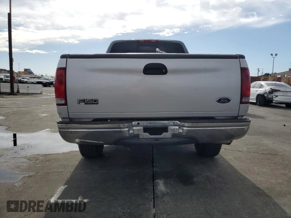 1998 Ford F-150 XL with VIN 1FTRX17L3WKB36791, listed as a Copart auction lot 42141915 with 201,067 mi miles and Salvage title. Bid and sale history available at DreamBid. Image 6.
