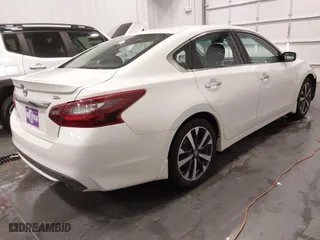 2017 Nissan Altima 2.5 SR with VIN 1N4AL3AP5HC265540, listed as a IAAI auction lot 41284731 with 125,504 mi miles. Bid and sale history available at carsss.com. Image 4.