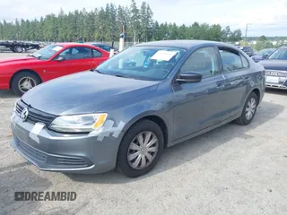 2013 Volkswagen Jetta S z VIN 3VW1K7AJ5DM242345, wystawiony jako IAAI lot #42598698 z przebiegiem 169 870 mil mil oraz . Historia ofert i sprzedaży dostępna na DreamBid. Obrazek 2.