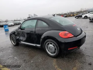 2012 Volkswagen Beetle 2.5L w/Sun/Sound/Nav PZEV with VIN 3VWJP7AT3CM642390, listed as a Copart auction lot 83999924 with 103,884 mi miles and Salvage Title. Bid and sale history available at carsss.com. Image 2.