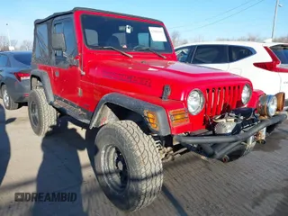 1997 Jeep Wrangler SE with VIN 1J4FY29PXVP476036, listed as a IAAI auction lot 41882559 with 82,888 mi miles. Bid and sale history available at carsss.com. Image 1.