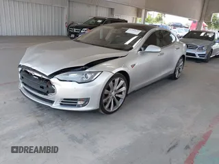 2013 Tesla Model S Performance with VIN 5YJSA1DP6DFP07999, listed as a IAAI auction lot 42284612 with 123,261 mi miles and . Bid and sale history available at DreamBid. Image 2.