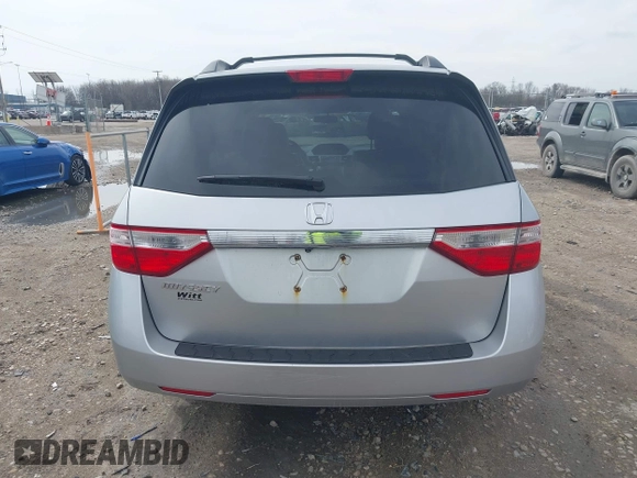 2013 Honda Odyssey LX with VIN 5FNRL5H22DB086503, listed as a IAAI auction lot 42133471 with 223,200 mi miles and . Bid and sale history available at carsss.com. Image 17.