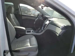 2014 Cadillac SRX with VIN 3GYFNAE38ES644876, listed as a Copart auction lot 50715955 with 106,262 mi miles and Salvage Title. Bid and sale history available at DreamBid. Image 7.