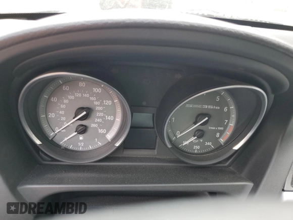 2015 BMW Z4 sDrive35is with VIN WBALM1C59FE634589, listed as a Copart auction lot 67096594 with Not provided miles and Salvage title. Bid and sale history available at DreamBid. Image 9.