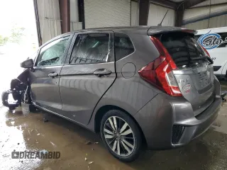 2016 Honda Fit EX with VIN JHMGK5H75GX034913, listed as a Copart auction lot 63948425 with 106,684 mi miles and Salvage title. Bid and sale history available at DreamBid. Image 2.