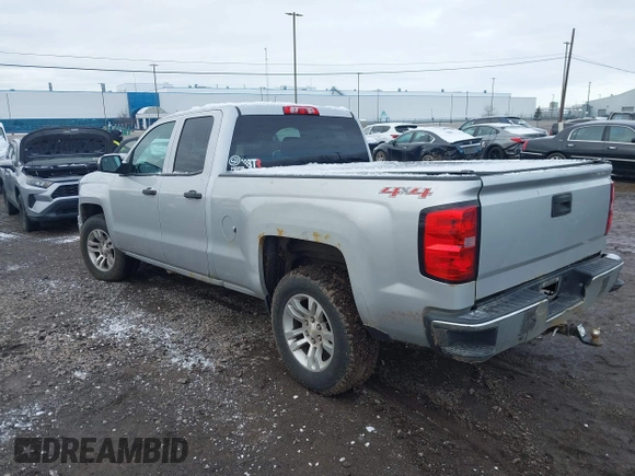 2014 Chevrolet Silverado 1500 LT with VIN 1GCVKREC5EZ115459, listed as a IAAI auction lot 41143910 with 275,008 mi miles and . Bid and sale history available at DreamBid. Image 3.