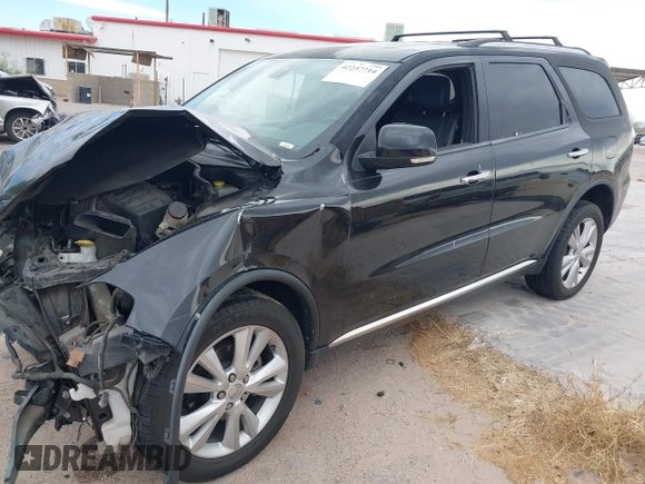 2013 Dodge Durango Crew with VIN 1C4RDHDG1DC647447, listed as a IAAI auction lot 42237714 with 177,523 mi miles and . Bid and sale history available at DreamBid. Image 2.