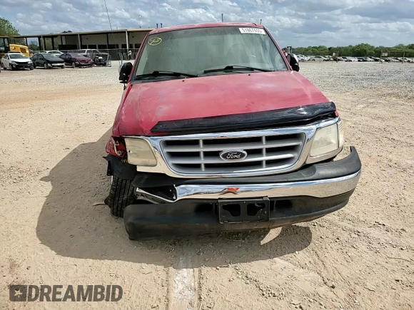 1999 Ford F-150 with VIN 1FTZX1725XNA33332, listed as a Copart auction lot 51867455 with 163,023 mi miles and Salvage title. Bid and sale history available at DreamBid. Image 11.