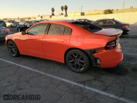 2021 Dodge Charger SXT with VIN 2C3CDXBG5MH533942, listed as a Copart auction lot 85306964 with 64,682 mi miles and Salvage Title. Bid and sale history available at carsss.com. Image 2.