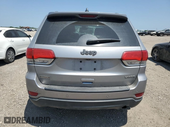 2017 Jeep Grand Cherokee Laredo with VIN 1C4RJEAG0HC816410, listed as a Copart auction lot 52909905 with 102,326 mi miles and Salvage title. Bid and sale history available at DreamBid. Image 6.