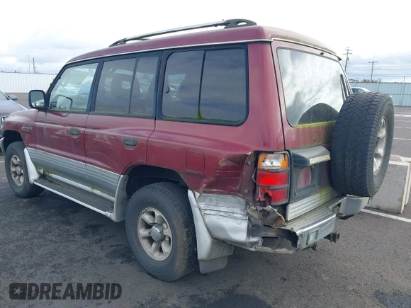 1998 Mitsubishi Montero z VIN JA4MR51RXWJ003468, wystawiony jako IAAI lot #41916695 z przebiegiem 214 694 mil mil oraz . Historia ofert i sprzedaży dostępna na DreamBid. Obrazek 3.