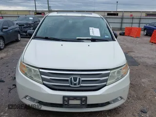 2013 Honda Odyssey Touring with VIN 5FNRL5H96DB074819, listed as a IAAI auction lot 41898358 with 123,428 mi miles and . Bid and sale history available at carsss.com. Image 12.
