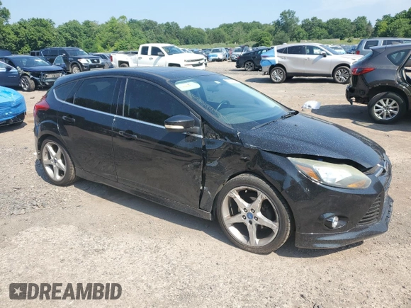 2014 Ford Focus Titanium with VIN 1FADP3N27EL251229, listed as a Copart auction lot 62201195 with 75,534 mi miles and Salvage title. Bid and sale history available at DreamBid. Image 4.