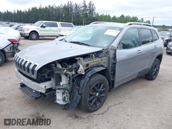 2014 Jeep Cherokee Latitude with VIN 1C4PJLCS1EW105984, listed as a IAAI auction lot 42242732 with 89,325 mi miles and . Bid and sale history available at DreamBid. Image 2.