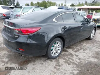 2016 Mazda 6 i Sport with VIN JM1GJ1U53G1451578, listed as a IAAI auction lot 42134810 with 113,144 mi miles and . Bid and sale history available at DreamBid. Image 4.