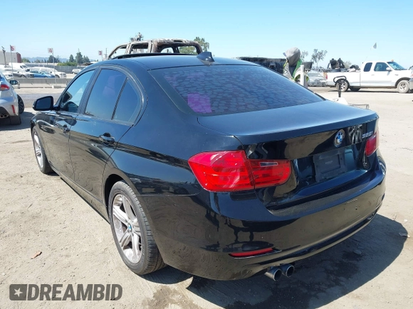 2013 BMW 3 Series 328i with VIN WBA3C1C51DF439693, listed as a IAAI auction lot 42644270 with 332,474 mi miles and . Bid and sale history available at DreamBid. Image 3.