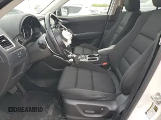 2016 Mazda CX-5 Touring with VIN JM3KE2CYXG0777715, listed as a Copart auction lot 52157005 with 58,585 mi miles and Salvage Title. Bid and sale history available at carsss.com. Image 7.