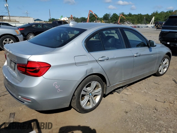 2018 BMW 3 Series with VIN WBA8F1C59JK898499, listed as a Copart auction lot 68247874 with 107,189 mi miles and Salvage title. Bid and sale history available at DreamBid. Image 3.