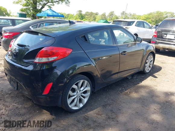 2013 Hyundai Veloster w/Black Int with VIN KMHTC6AD2DU120059, listed as a IAAI auction lot 42355902 with 81,221 mi miles and . Bid and sale history available at DreamBid. Image 4.