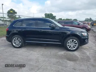 2015 Audi Q5 Premium with VIN WA1CFAFP0FA041103, listed as a IAAI auction lot 42154624 with 123,107 mi miles. Bid and sale history available at carsss.com. Image 13.