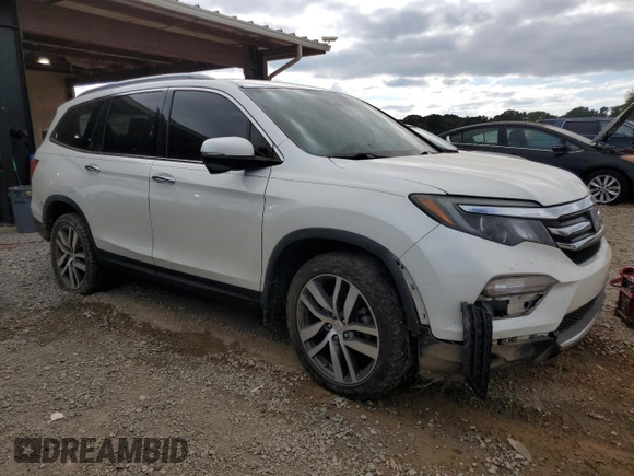 2017 Honda Pilot Touring z VIN 5FNYF6H92HB067140, wystawiony jako Copart lot #72200584 z przebiegiem 127 856 mil mil oraz Szkoda całkowita • Salvage title. Historia ofert i sprzedaży dostępna na DreamBid. Obrazek 4.
