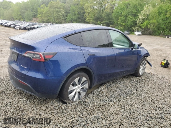 2022 Tesla Model Y Long Range z VIN 7SAYGDEE6NF318808, wystawiony jako Copart lot #57219915 z przebiegiem Nie podano mil oraz Szkoda całkowita • Salvage title. Historia ofert i sprzedaży dostępna na DreamBid. Obrazek 3.