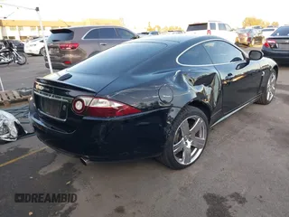 2008 Jaguar XK with VIN SAJWA43B985B23987, listed as a IAAI auction lot 41197091 with 54,803 mi miles. Bid and sale history available at carsss.com. Image 4.