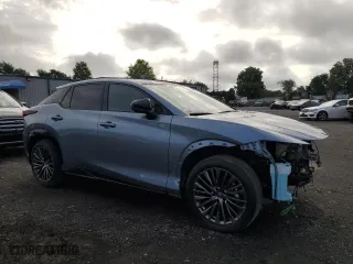 2023 Lexus RZ with VIN JTJAAAAB0PA011699, listed as a Copart auction lot 65108714 with 12,365 mi miles and Salvage Title. Bid and sale history available at carsss.com. Image 4.