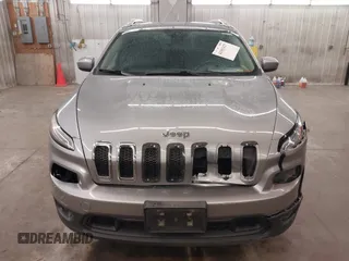 2014 Jeep Cherokee Altitude with VIN 1C4PJMCB9EW149754, listed as a IAAI auction lot 41983427 with 199,810 mi miles and . Bid and sale history available at DreamBid. Image 13.