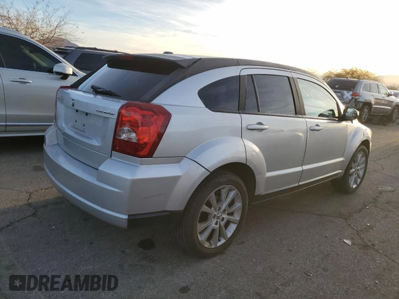 2011 Dodge Caliber Heat with VIN 1B3CB5HA7BD141422, listed as a Copart auction lot 42651095 with 148,995 mi miles and Salvage Title. Bid and sale history available at DreamBid. Image 3.