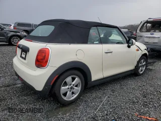 2019 MINI Convertible Cooper z VIN WMWWG5C54K3F79764, wystawiony jako Copart lot #48692085 z przebiegiem 94 211 mil mil oraz Szkoda całkowita • Salvage title. Historia ofert i sprzedaży dostępna na DreamBid. Obrazek 3.