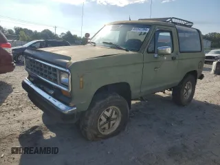 1987 Ford Bronco z VIN 1FMCU14T6HUC98971, wystawiony jako Copart lot #69262784 z przebiegiem 49 522 mil mil oraz Czysty tytuł • Clean title. Historia ofert i sprzedaży dostępna na DreamBid. Obrazek 1.