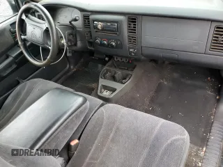 2001 Dodge Dakota Sport z VIN 1B7GL22N31S137577, wystawiony jako Copart lot #50119405 z przebiegiem Nie podano mil oraz Czysty tytuł • Clean title. Historia ofert i sprzedaży dostępna na DreamBid. Obrazek 8.