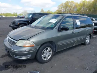 2001 Ford Windstar SE with VIN 2FMDA52441BA08464, listed as a IAAI auction lot 42178086 with 121,683 mi miles and . Bid and sale history available at carsss.com. Image 2.