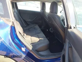 2018 Tesla Model 3 Long Range Battery with VIN 5YJ3E1EA6JF027065, listed as a IAAI auction lot 40532631 with 55,316 mi miles. Bid and sale history available at carsss.com. Image 8.