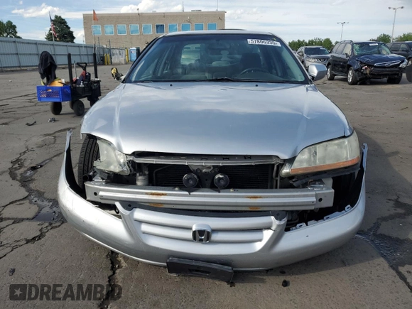 2002 Honda Accord LX z VIN JHMCG56442C016427, wystawiony jako Copart lot #57806335 z przebiegiem 176 816 mil mil oraz Szkoda całkowita • Salvage title. Historia ofert i sprzedaży dostępna na DreamBid. Obrazek 5.