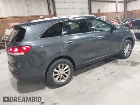 2017 Kia Sorento LX with VIN 5XYPGDA38HG250523, listed as a IAAI auction lot 41965678 with 100,794 mi miles. Bid and sale history available at carsss.com. Image 4.